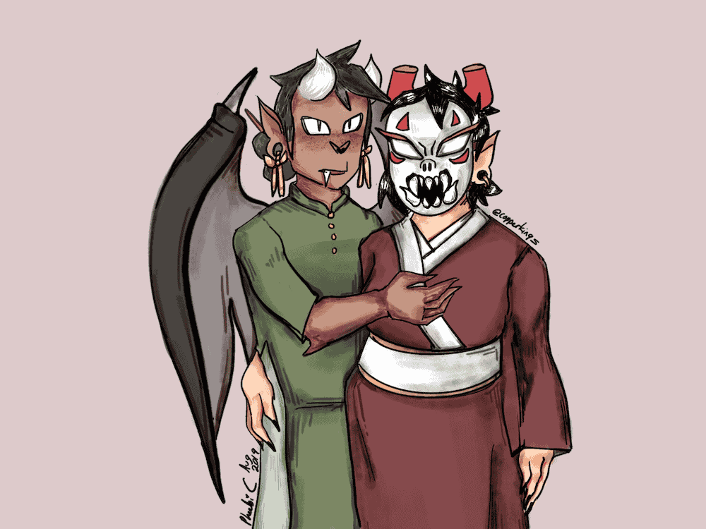 Two characters standing against a pale pink background; the image cuts off just before their knees. The character on the left is a gargoyle with brown skin and large gray wings, wearing a green ao dai and gold dangly earrings. Her hand is on the chest of the character on the right, whose hand is around the gargoyle girl's waist. She is wearing traditional Japanese robes that are red.